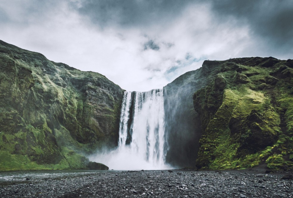 beautiful-shot-waterfall-coming-down-from-mountains